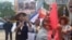 Cubanos se manifiestan en Bruselas el 17 de julio de 2023 por la presencia de representantes del régimen cubano en la reunión de la CELAC.