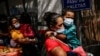 Migrantes en busca de asilo de América Central en frontera EEUU-México.