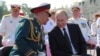 El Presidente ruso Vladimir Putin y el ministro de Defensa Sergei Shoigu. Foto Archivo.